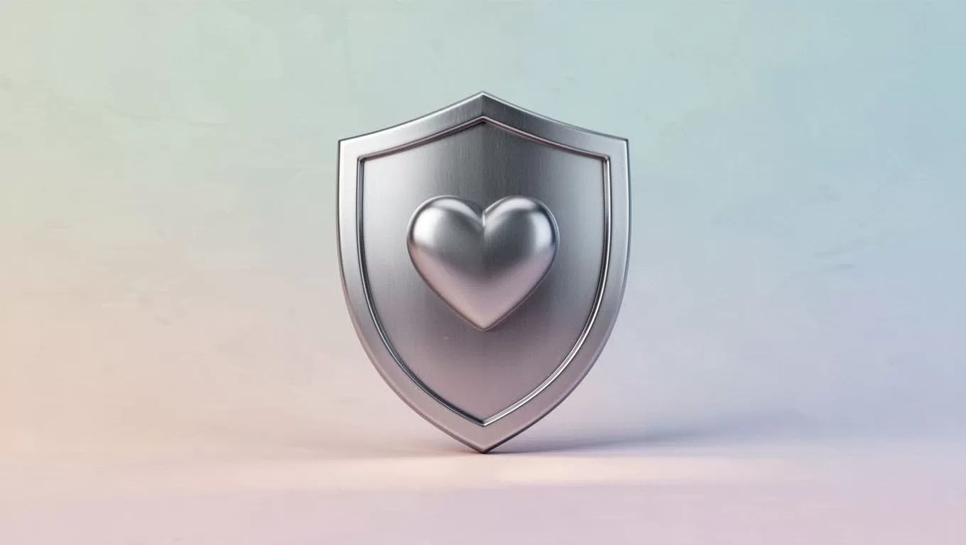 Clean illustration of a digital shield containing a heart on a soft background.