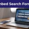 Laptop showing a travel search form beside a passport and boarding pass.