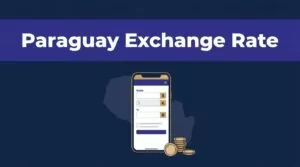 A smartphone shows an exchange rate beside a Paraguay map and coins.