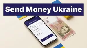 A smartphone and Ukrainian hryvnia note beneath a blue money transfer headline.