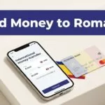 Phone displaying a money transfer screen beside a Romanian bank card.
