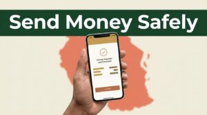 A hand holds a smartphone showing a money transfer confirmation.