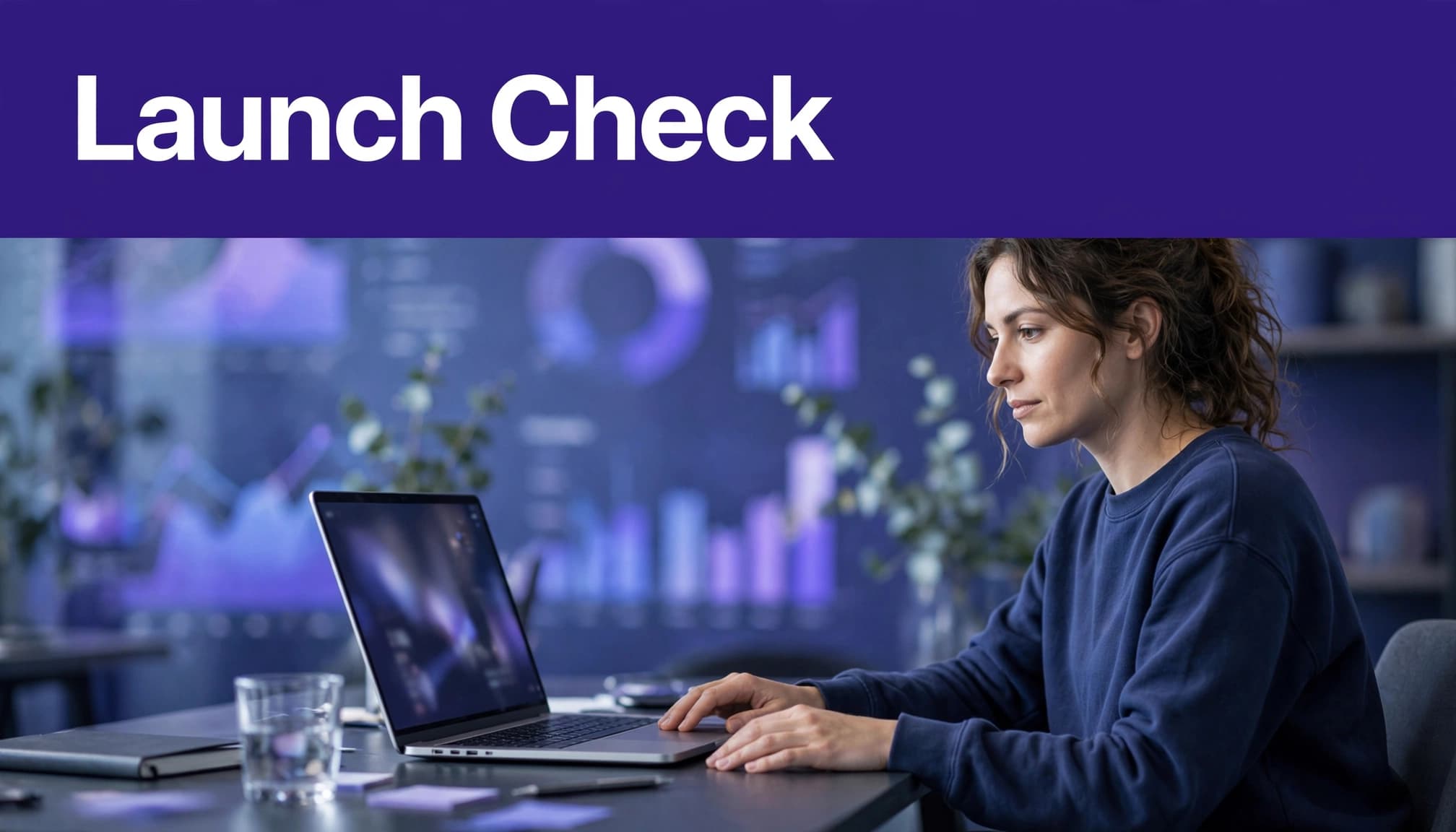 A seated operator reviews referral tracking and payment setup on a laptop.